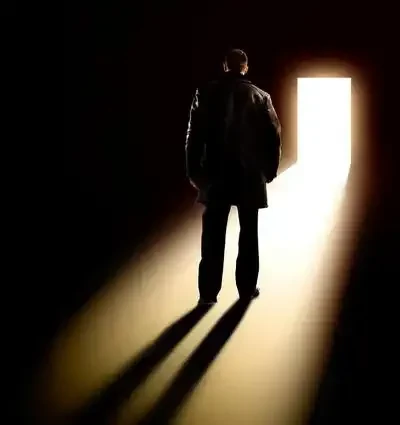 Business Metaphor - businessman walking towards door bought from Dreamstime